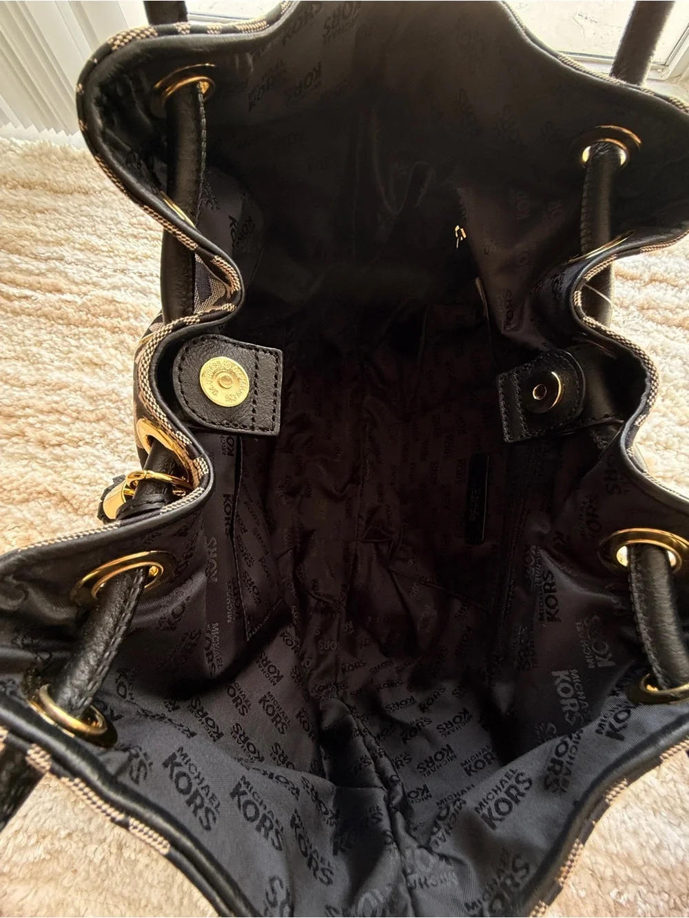 Michael Kors Brown and Black MK Signature Tote with Tassel Charm